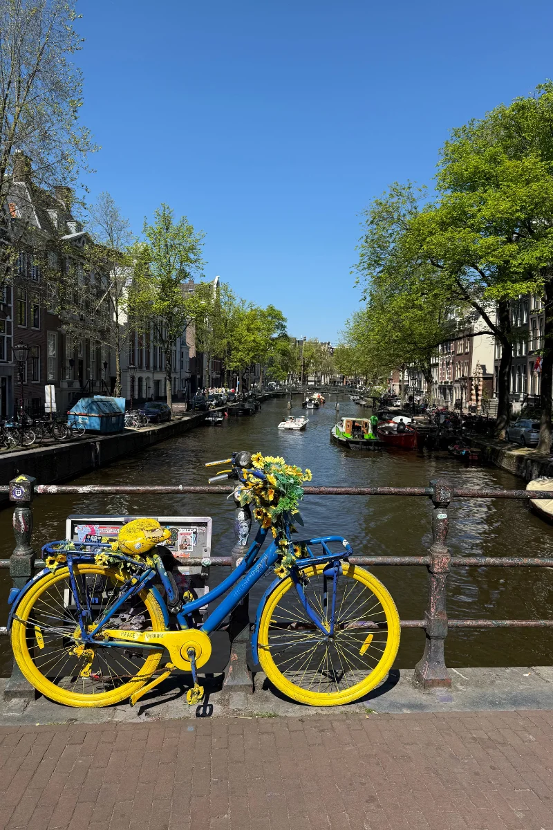 Amsterdam canal boat rental routes - scenic waterway through historic city