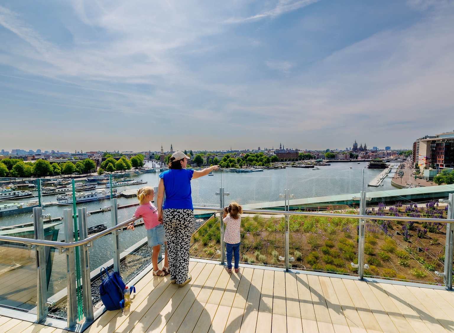 NEMO rooftop in Amsterdam with families looking over the harbour